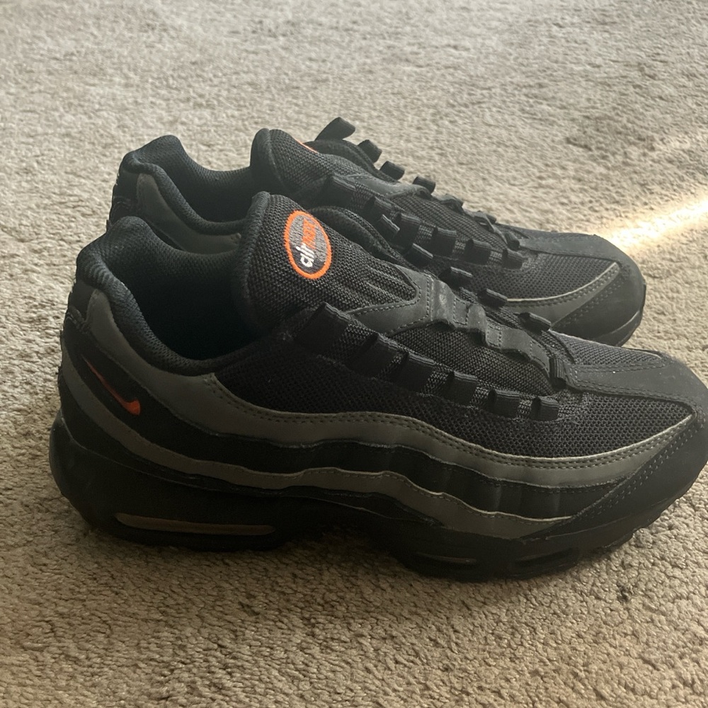 Black and Gray Sneakers with Orange Accents